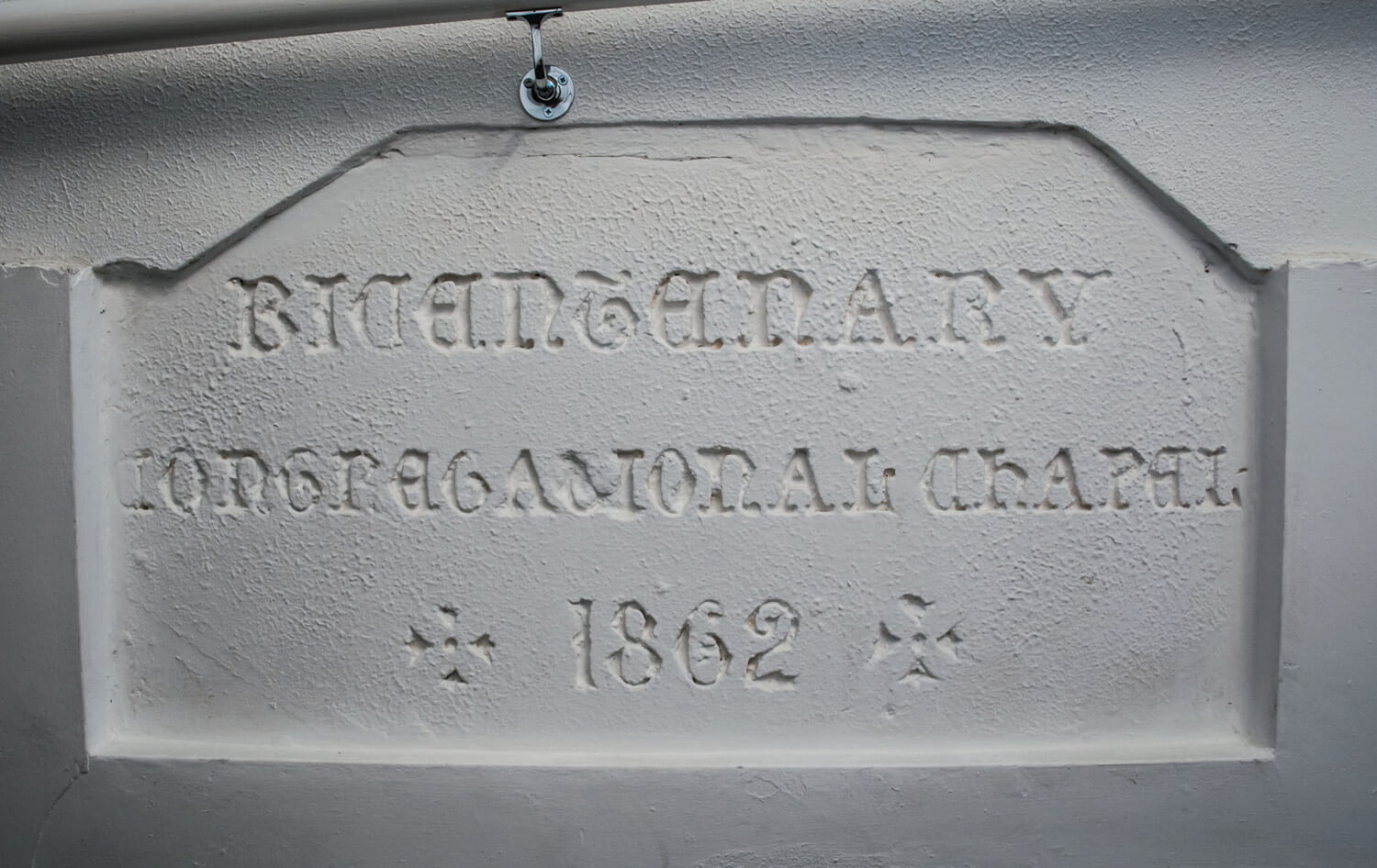 A carved stone from when the building was the Congregational Chapel -