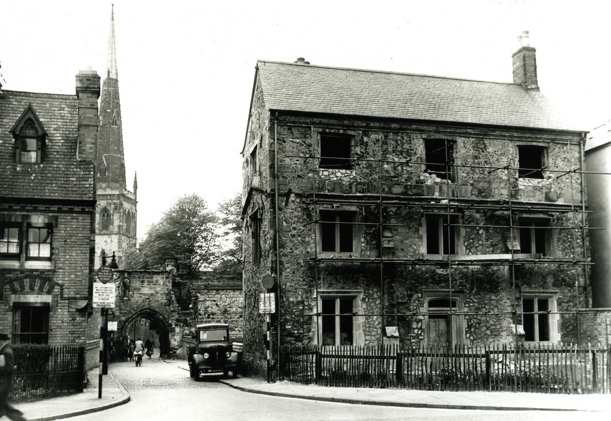 Chantry House with scaffolding after bomb damage during WWII -