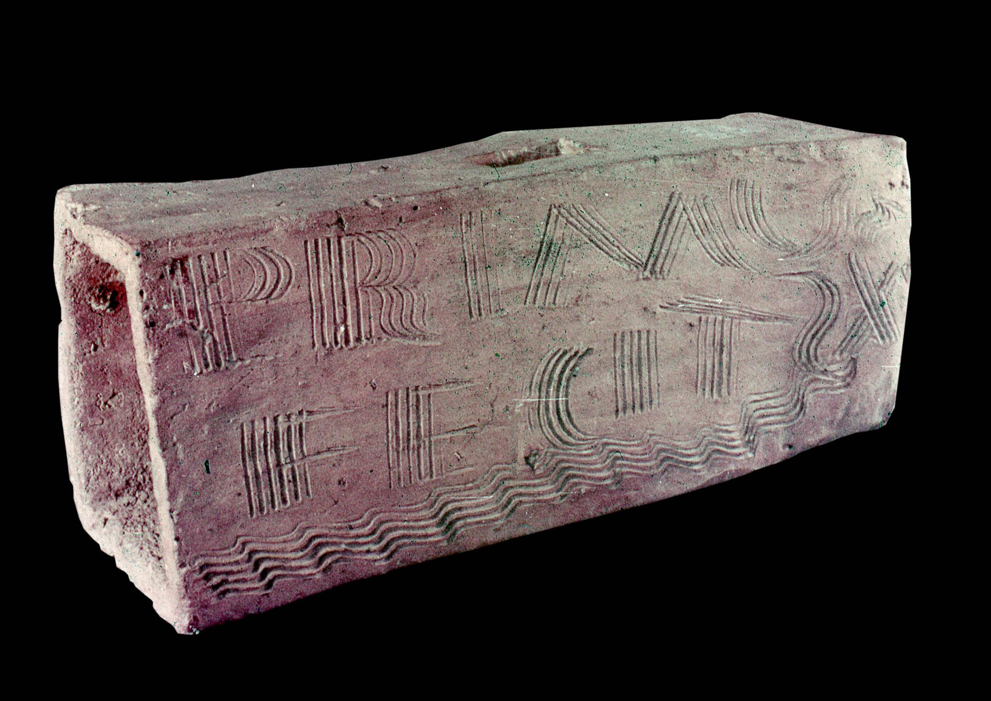 A Roman tile maker from Leicester has written the words PRIMUS FECIT X, meaning ‘Primus has made ten tiles’, on this box flue before it was fired - Leicester Arts & Museums Service