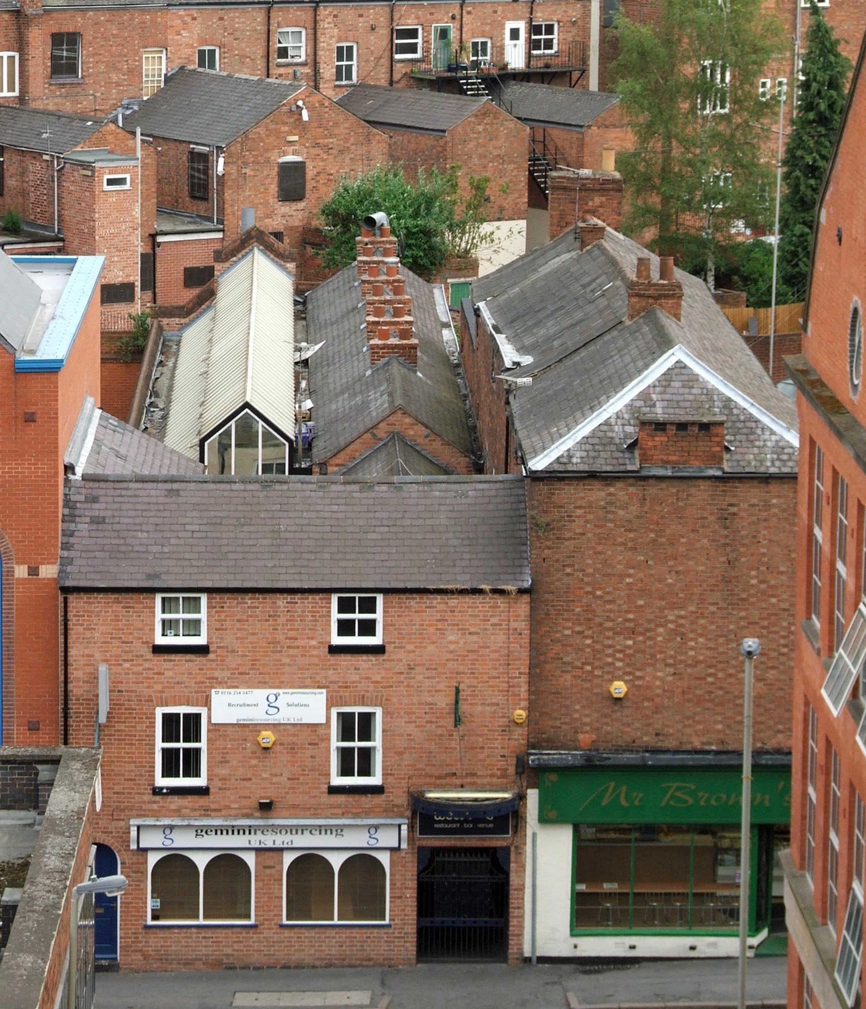 Looking down on Cramants Yard (and Cottages) showing the now covered outdoor area (white roof to the left) -