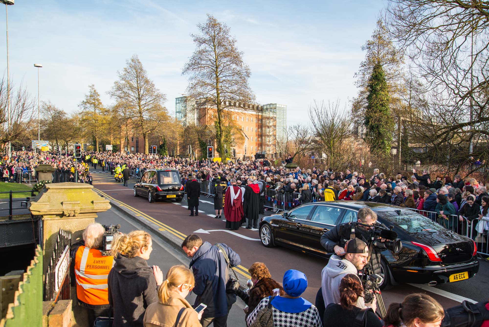 Richard III’s remains passing over the Bow Bridge with large crowds watching, 2015 -