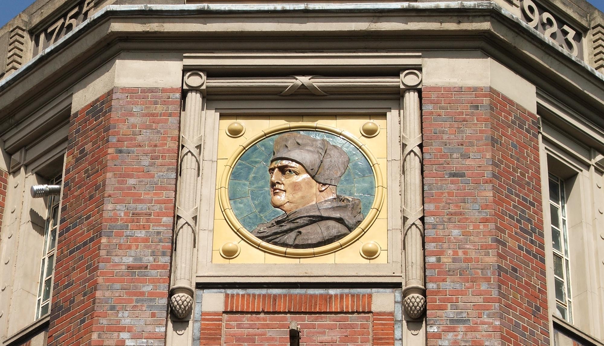 A large portrait of Cardinal Wolsey on the former Wolsey Knitwear Factory near to Abbey Park, built in 1923 -