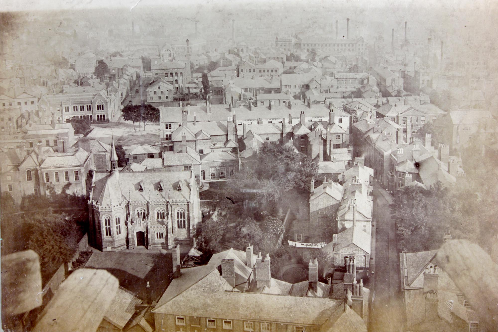 The Grey Friars site from St Martin’s steeple in 1867, looking south. In the foreground is the Alderman Newton’s School (today the Richard III Visitor Centre) before it was extended in 1887 and 1897. Richard III’s grave was found in the garden to the right of the school - Leicester Record Office