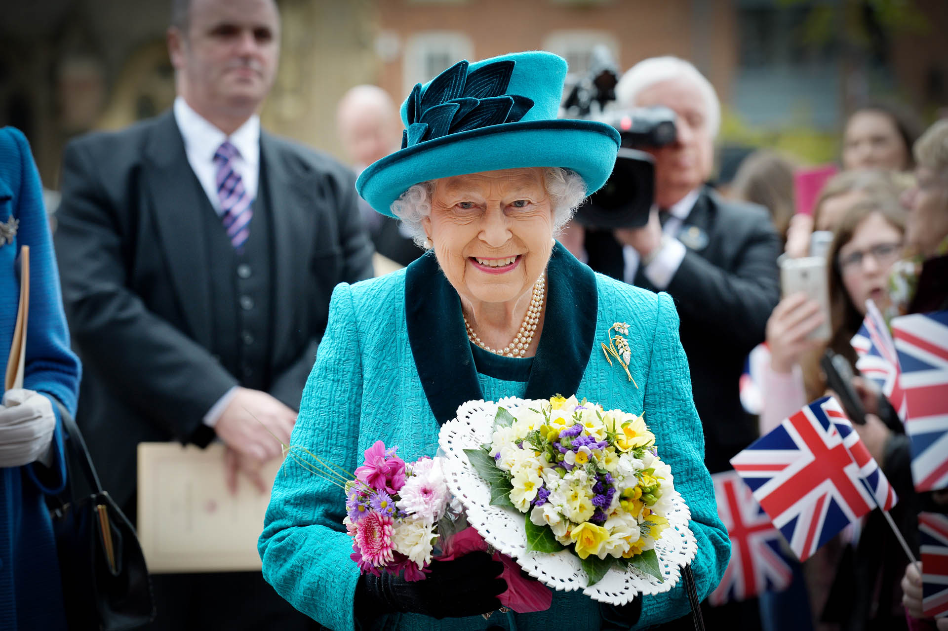 The Queen dressed in one of her trademark colourful outfits, Leicester, 2017 - Picture by Beth Walsh